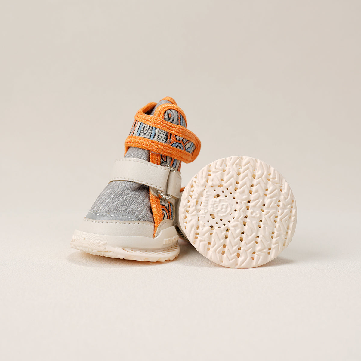 CityLuxury orange dog shoe showing ventilated sole