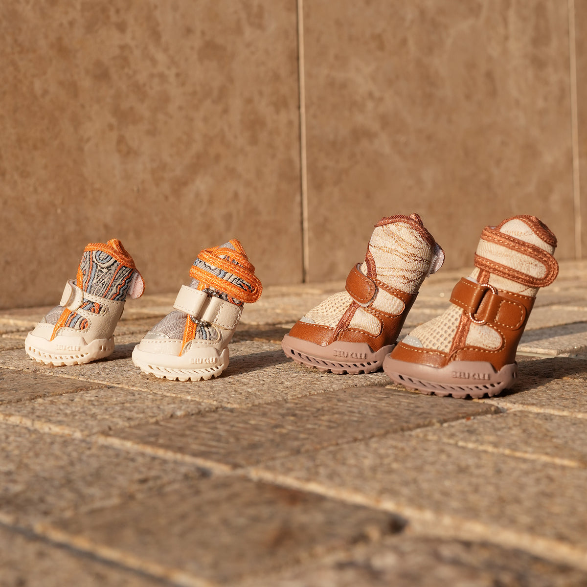 CityLuxury orange and brown dog shoes outdoors